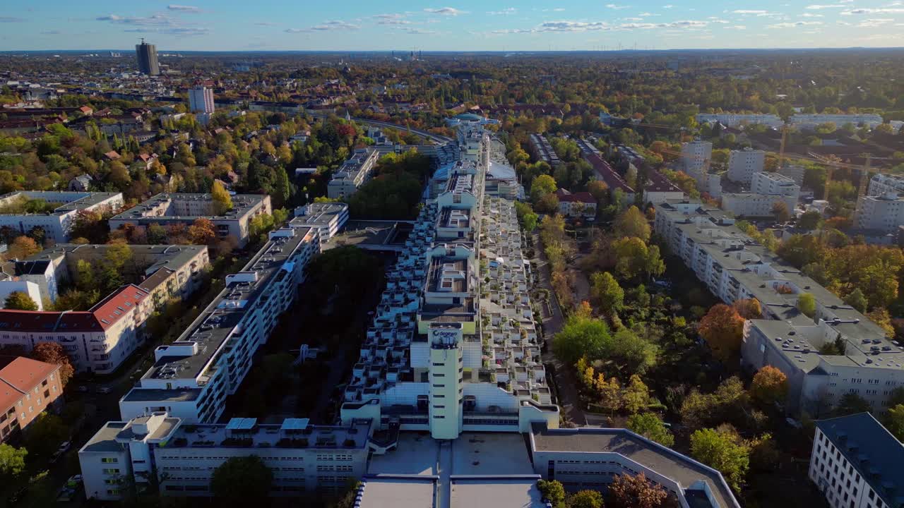 modern residential buildings Snake highway route Tunnel House and parks in the Charlottenburg Wilmersdorf district. Majestic aerial view flight fly reverse overflight flyover drone