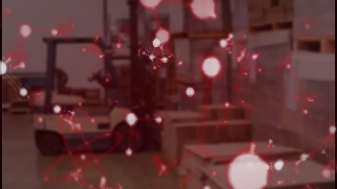 Red particles and glowing lights animation over warehouse with stacked boxes