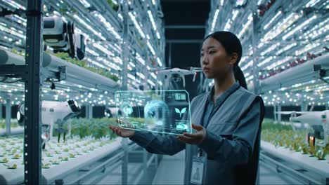 exploring innovations in vertical farming technology: a focused observer in a high-tech greenhouse monitoring plant growth with advanced data displays