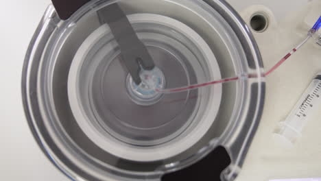 centrifuge for plasma extraction. top view. plasmolifting therapy preparation. close up.