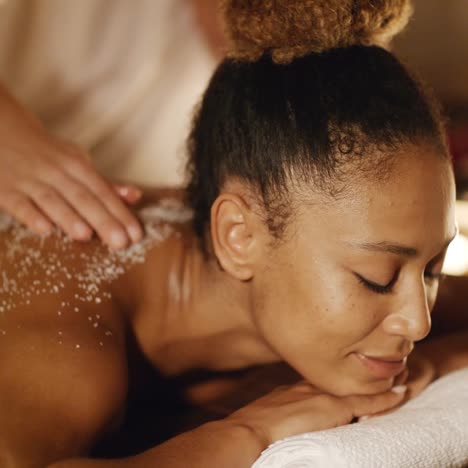 woman getting a relaxing massage in salon