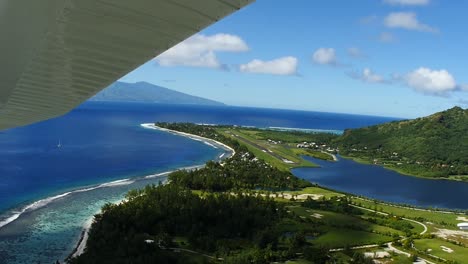 moorea airport view from a cessna. sunny day in french polynesia