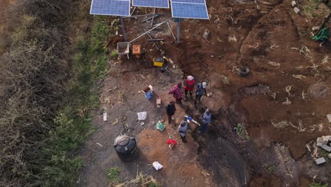 water-pump-aerial-view-of-people-working-under-solar-water-pump