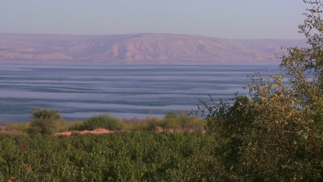 establishing shot of the sea of galilee in israel