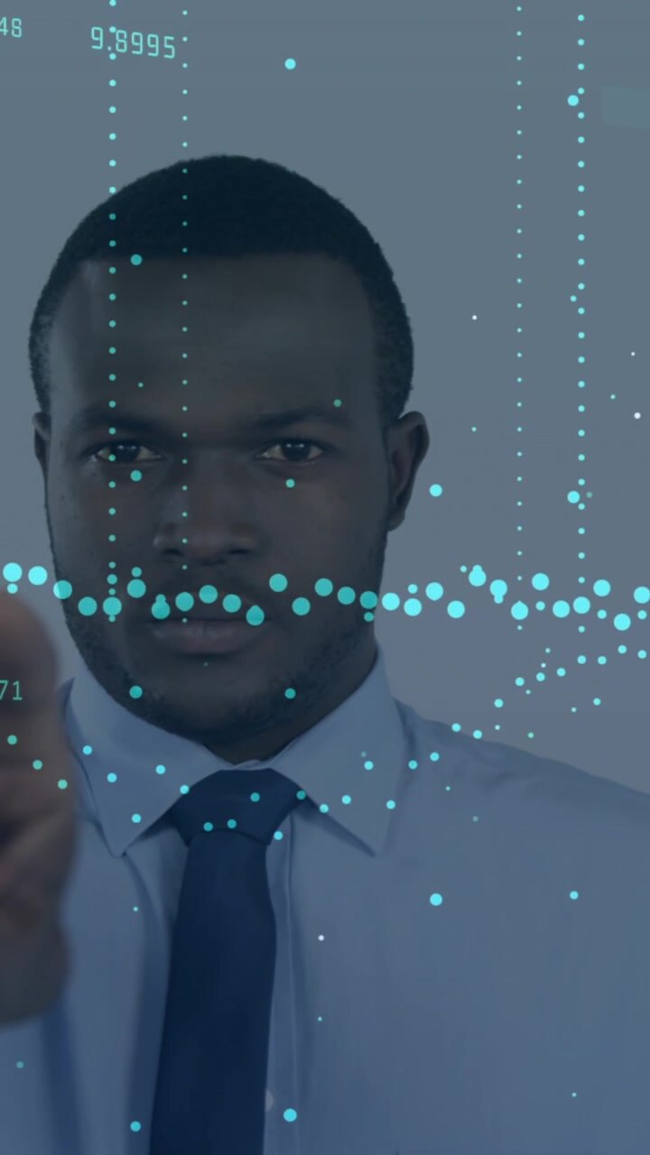 Animation of financial data over african american businessman
