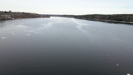 Aerial-Left-to-Right-motion-over-Kennebec-River-to-reveal-Pilot-Tug-Boat