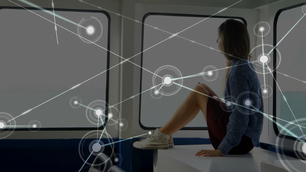 Network connections animation over person sitting by window on boat