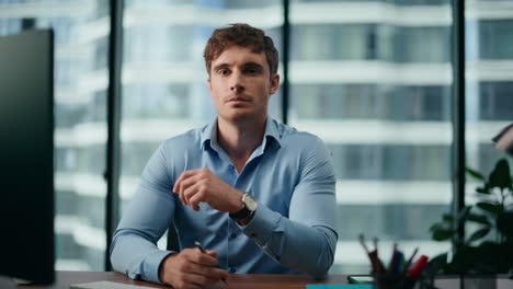 unfocused office manager sitting closeup. fatigue ceo thinking about problems