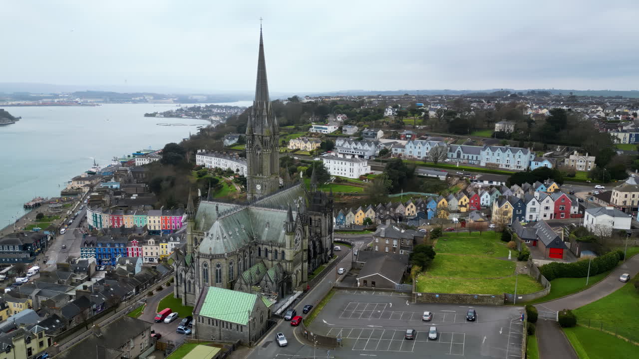 Aerial drone view of the colourful houses surrounding the St Colman's Cathedral in Cork, Ireland