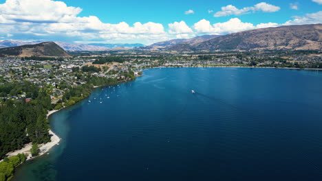 wanaka cityscape on lake coastline in new zealand, aerial drone view