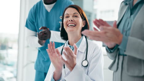 doctors applauding in a meeting