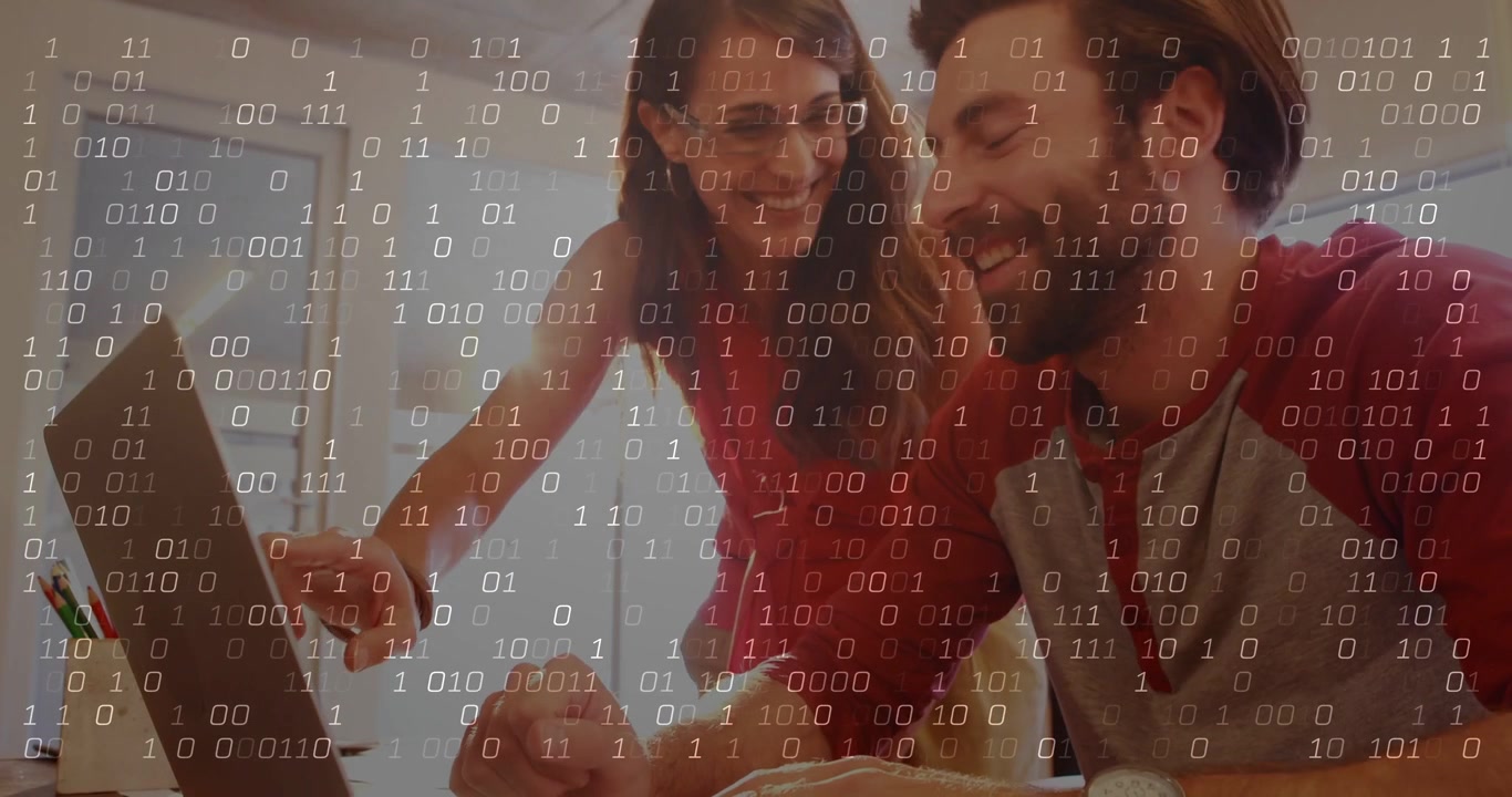Binary overlay appearing covering faces man typing woman pointing at laptop reviewing tech data