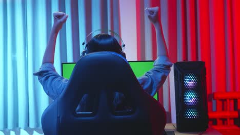 Young Asian Girl Gamer Win With Green Screen Display