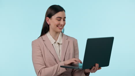 Happy,-typing-and-business-woman-on-laptop