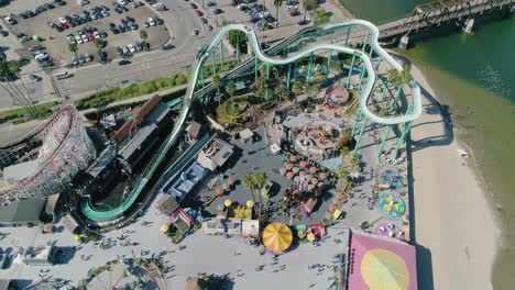 aerial of santa cruz beach boardwalk amusement park rising orbit