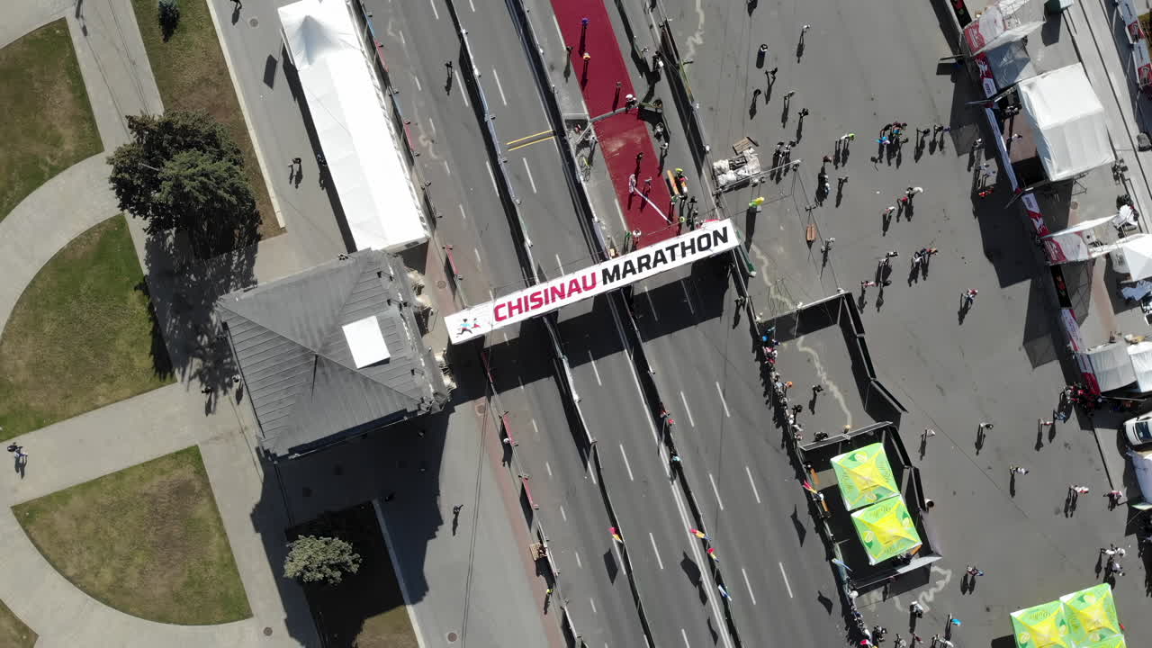 Chisinau, Moldova - September 10, 2021: Participants fill the streets of Shanghai for a spirited marathon, surrounded by cheering fans and colorful stalls, creating an energetic and festive scene