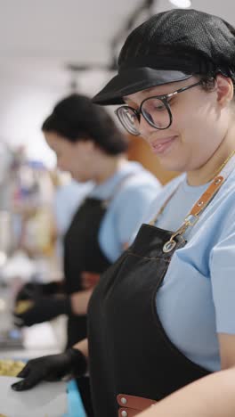 chef in blue shirt and apron