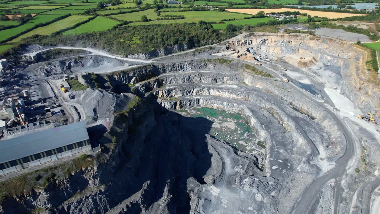 Ireland Epic Locations drone circling deep quarry and processing plant
