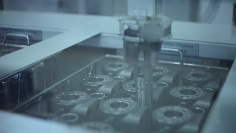 robot assembling industrial product at factory. industrial robot working