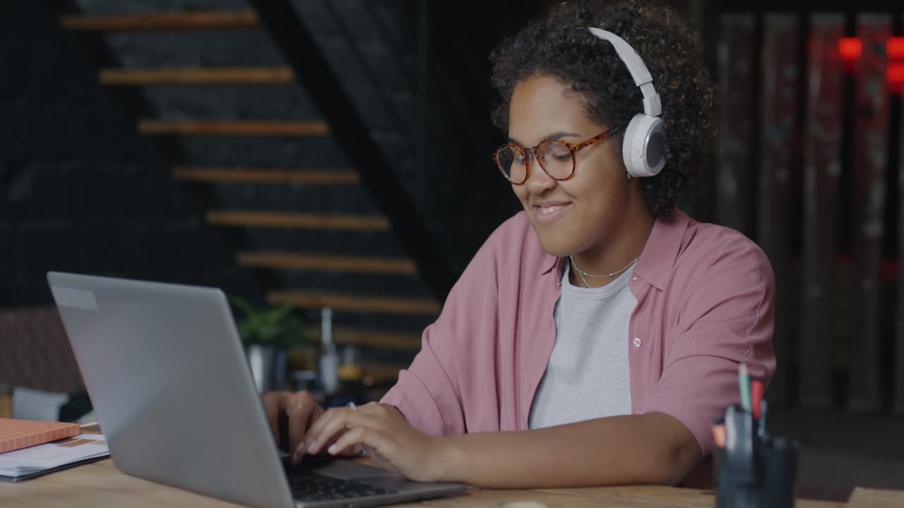 Young Woman Working on Laptop