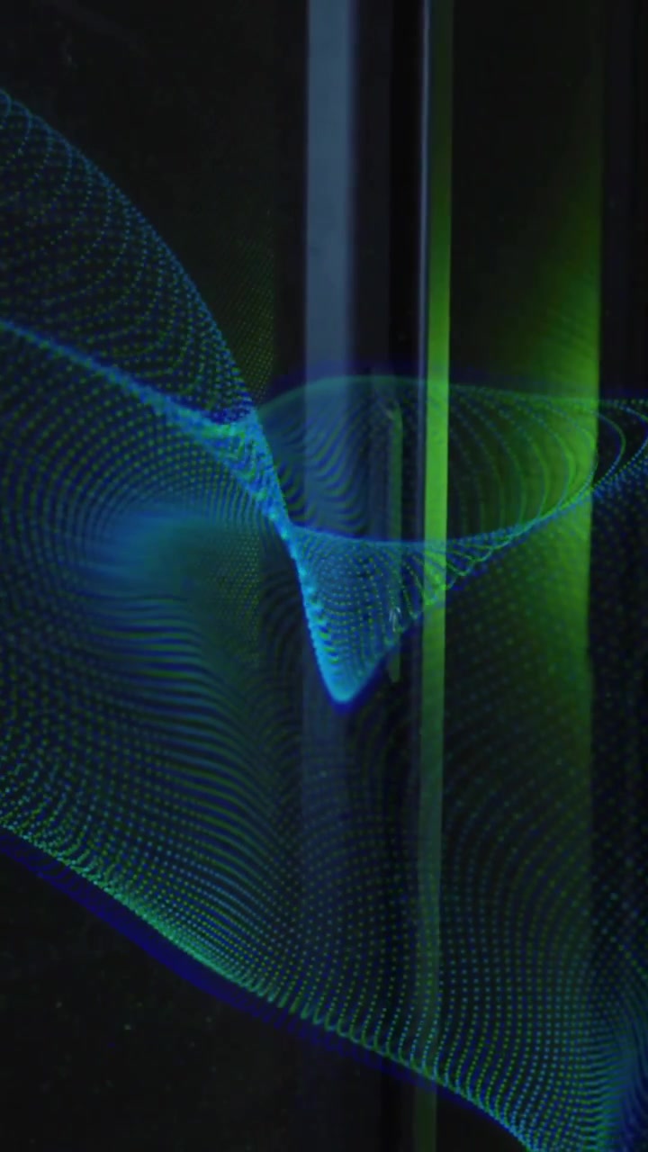Animation of blue network wave moving over dark computer server room
