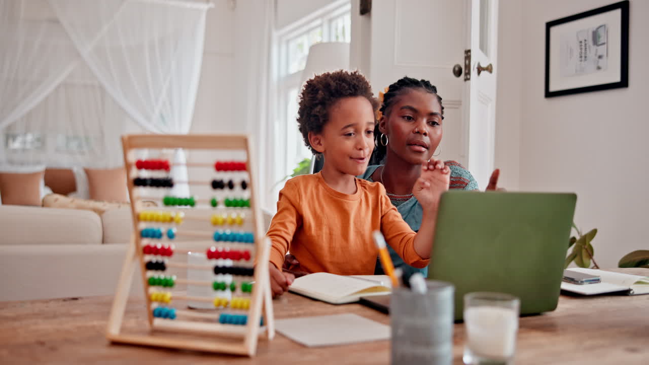 Mother and child learning together at home