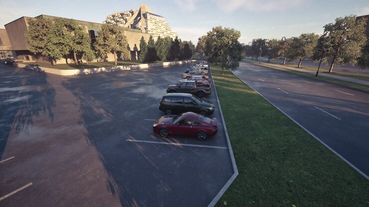 Vista matutina de un estacionamiento con varios coches aparcados