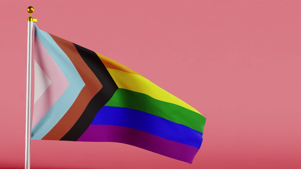 Progress pride flag waving on pole against solid pink background. Fabric texture with rainbow colors and chevron stripes in blue, pink, white, brown, and black. LGBTQ+ identity and equality concept