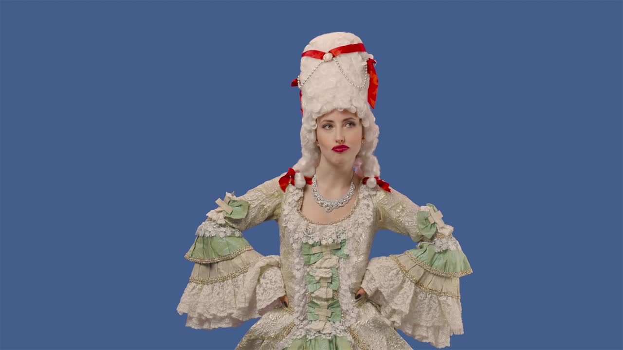 Portrait of courtier lady in white vintage lace dress and wig, enjoying chewing gum. Young woman posing in studio with blue screen background. Close up. Slow motion ready 59.94fps