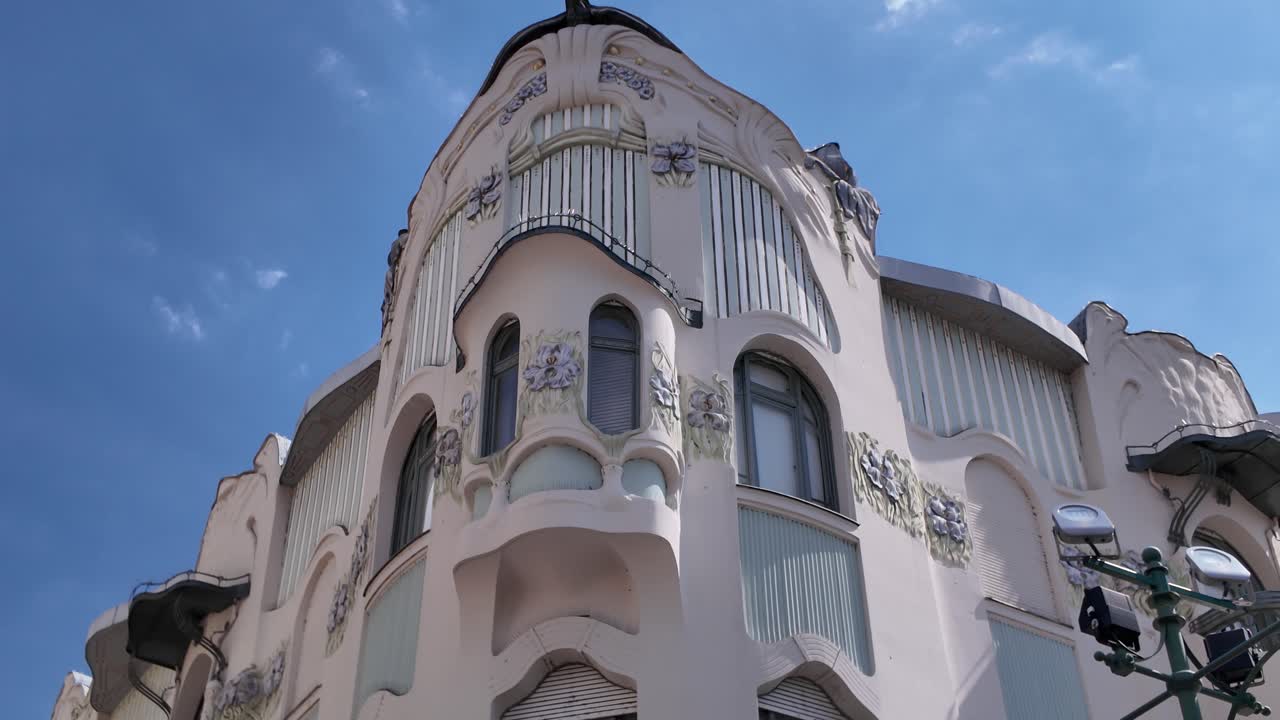 Reök Palace in Szeged, Hungary, highlighting its unique facade and striking architectural details