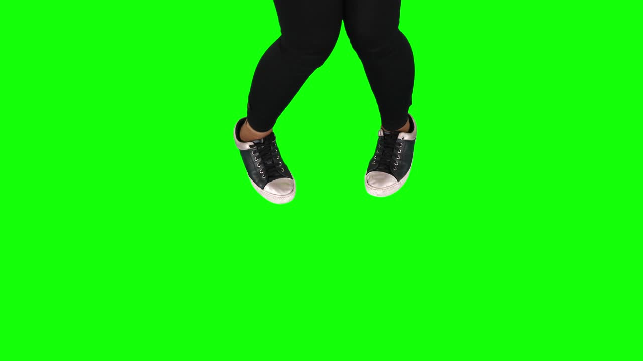 Hip-hop dancer feet doing movement in studio