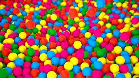 multicolored spheres closeup in pool for children fun abstract background