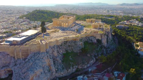 parthenon - aerial view of athenian acropolis with remains of ancient buildings and old acropolis museum in athens, greece