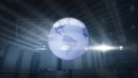 globo giratorio y punto de luz contra el almacén en el fondo