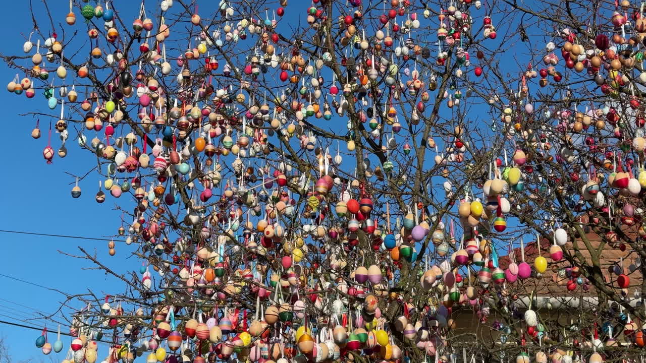 Easter egg tree with colorful hanging decorations