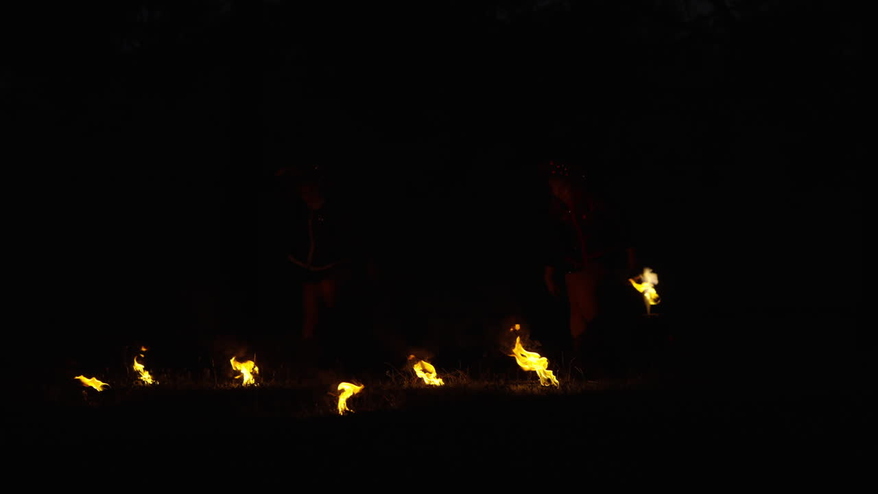 Fire Dancers at Night
