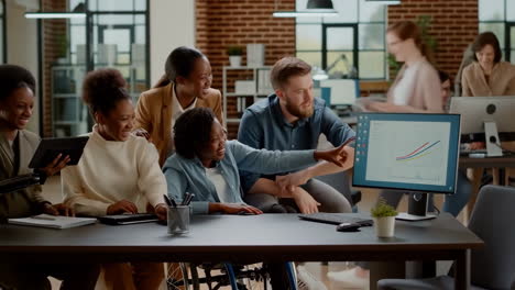 diverse business team collaborating on data analysis in a modern office