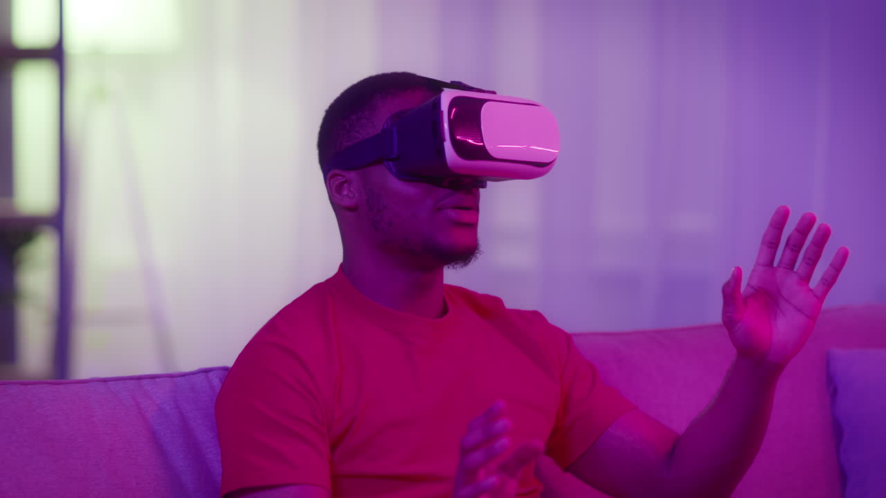 Man Experiencing Virtual Reality at Home