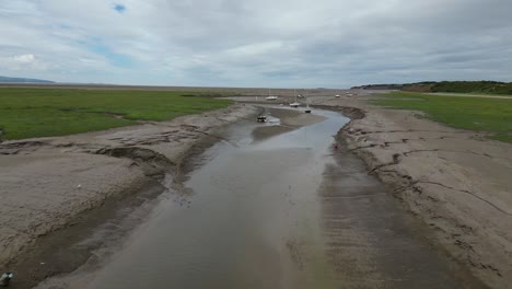 Flying-close-to-some-water-on-the-beach-line-at-Heswall