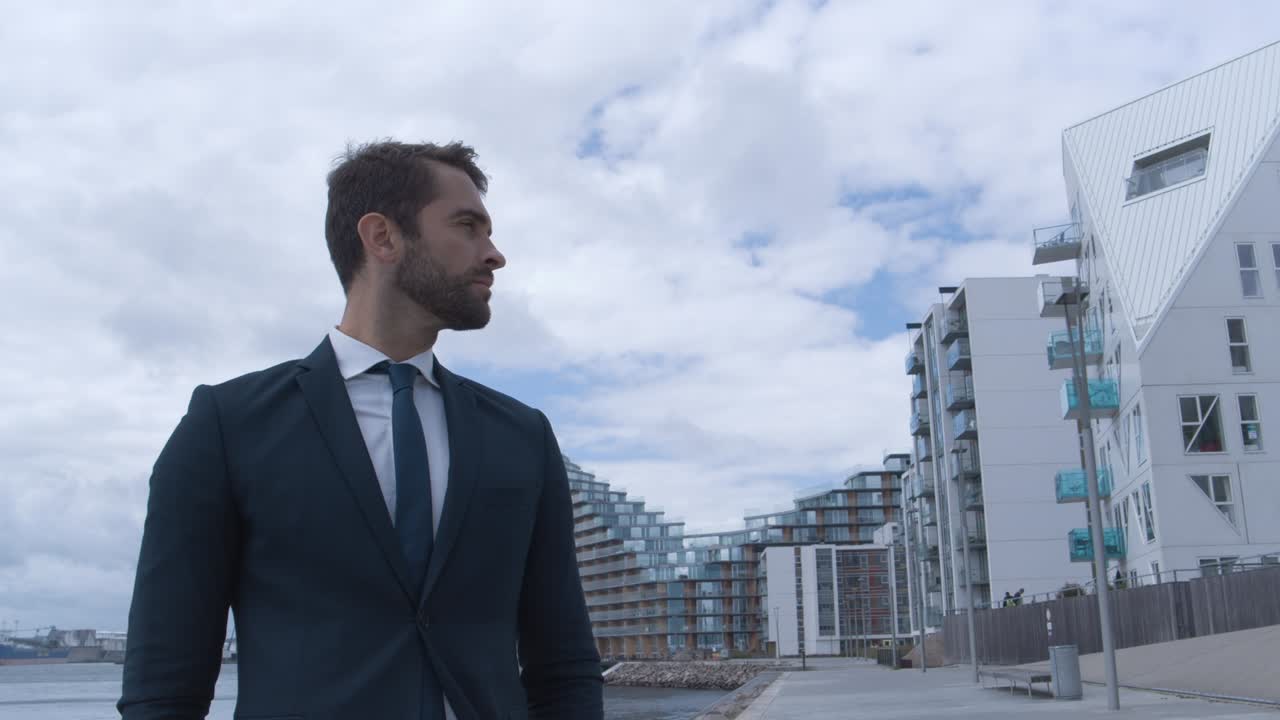 Serious Businessman Looking Around