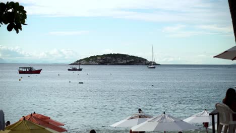 View-of-Joao-Fernandes-Beach-Sea-Water-Island-Landscape-in-Rio-de-Janeiro-Brazil-with-Tourists