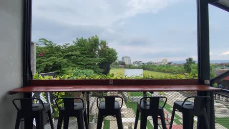 relaxing outdoor cafe with city view