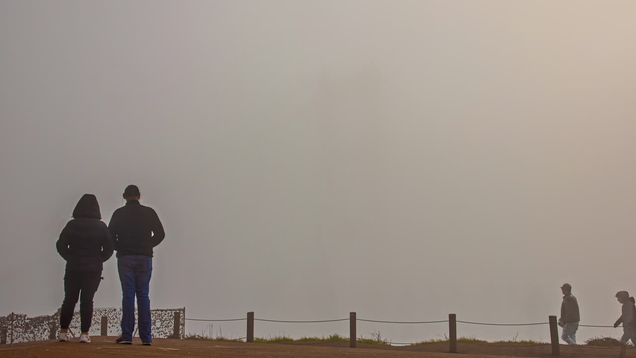 Foggy morning bridge fusion fog San Francisco USA hide and seek time lapse