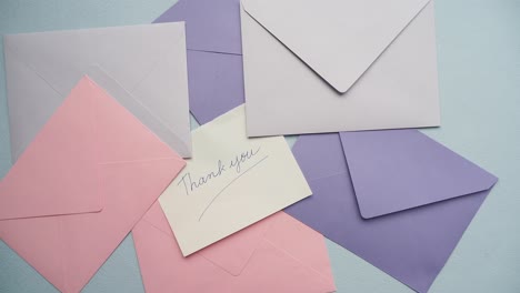 colorful envelopes and a thank you note