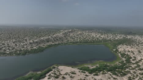 Aerial-shot-of-Beautiful-Botar-Lake,-in-Sanghar,-Sindh-Pakistan