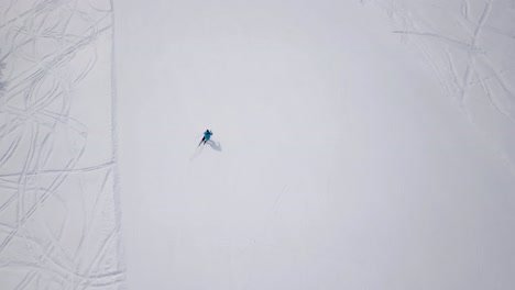 Aerial-of-ski-resort-at-sun-mountains-with-pine-forest