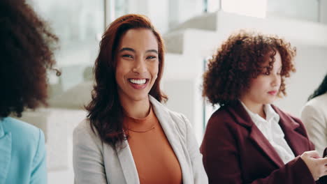 smiling businesswomen in a meeting