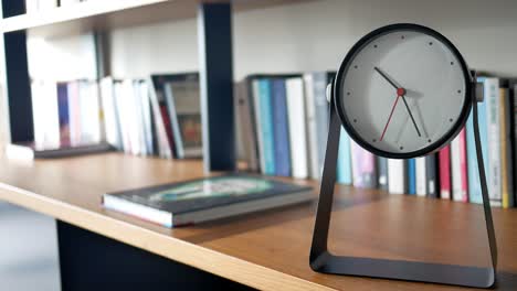 clock on bookshelf