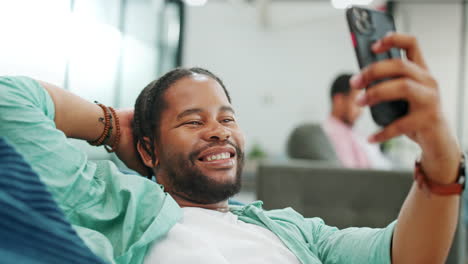 Black-man,-phone-and-peace-sign-on-video-call