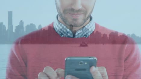 Digital-composition-of-mid-section-of-caucasian-man-smiling-while-using-smartphone-against-cityscape